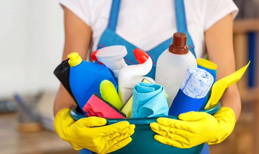 Cleaner Holding Bucket Full Of Products